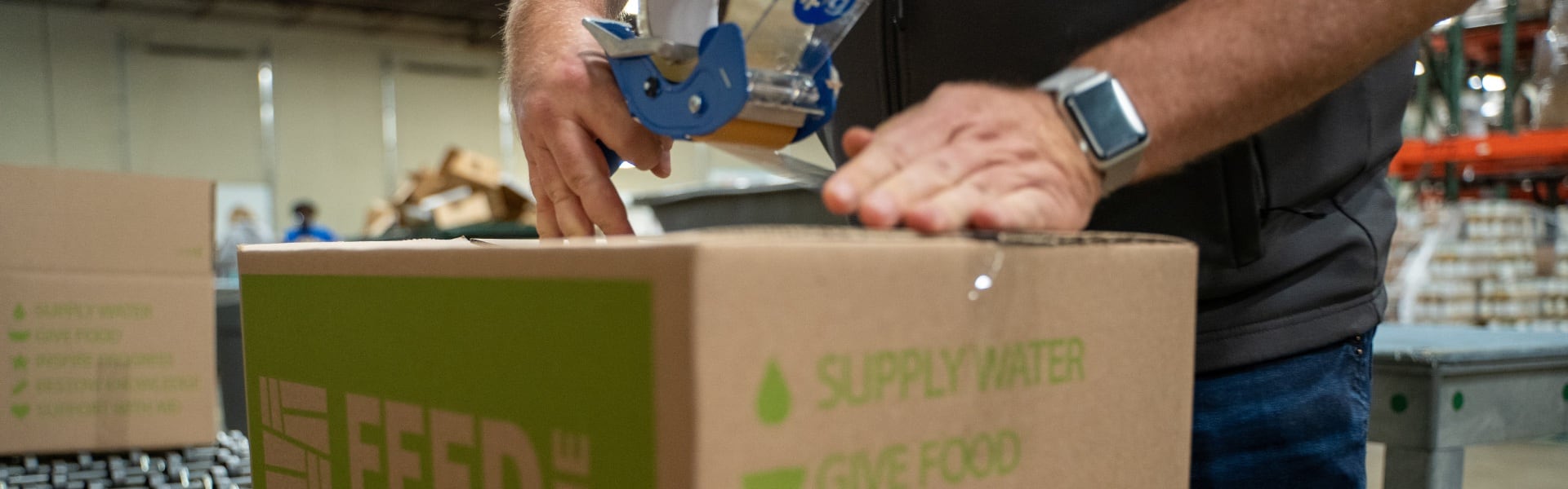 A box being taped closed